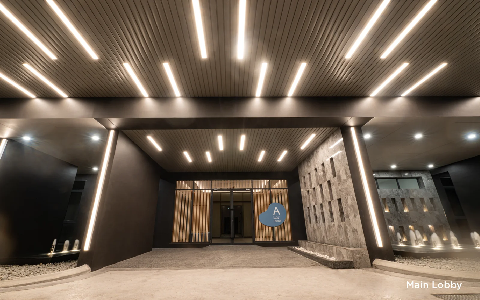 Photograph of the completed main lobby entrance at Mira at Shorea Park